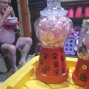 Red Gumball Machine with Paw Prints.